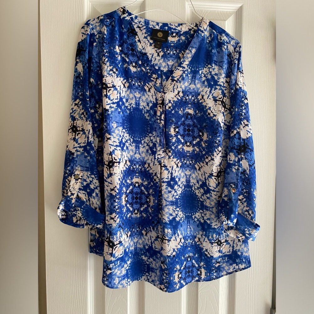 JM Collectables stylish blouse.  Never worn, but tags removed.